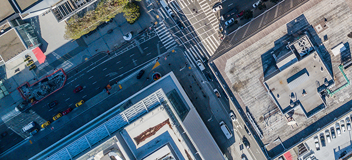 An aerial birds eye  view of San Francisco looking straight down at the skyscrapers and streets in the financial district.