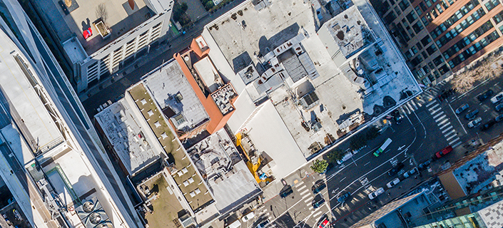 An aerial birds eye  view of San Francisco looking straight down at the skyscrapers and streets in the financial district.