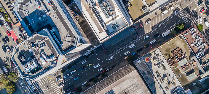 An aerial birds eye  view of San Francisco looking straight down at the skyscrapers and streets in the financial district.