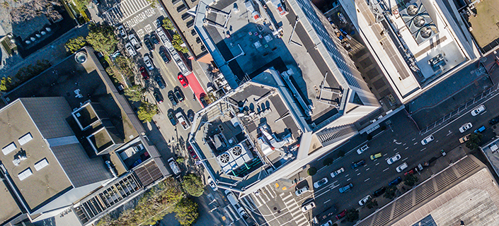 An aerial birds eye  view of San Francisco looking straight down at the skyscrapers and streets in the financial district.