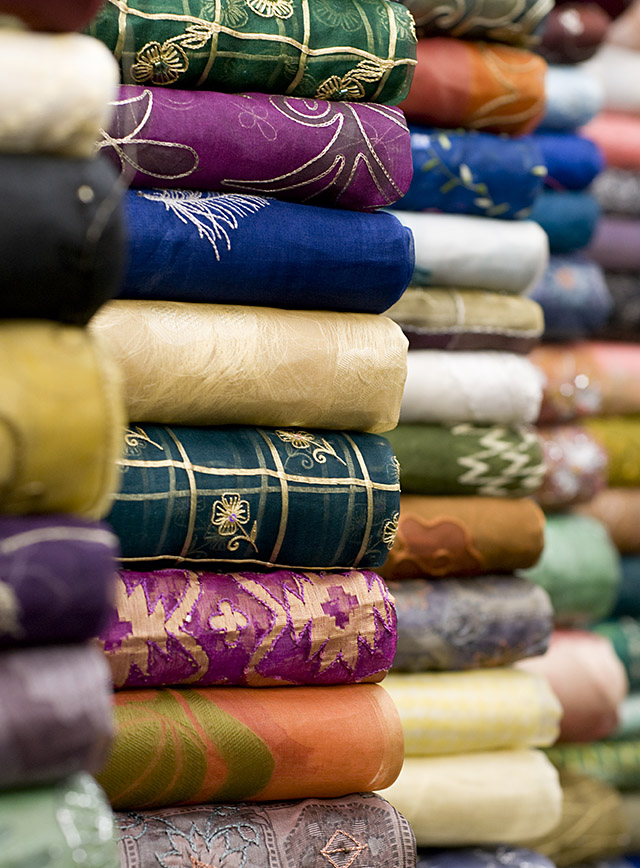 Masses of multicoloured materials.