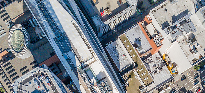 An aerial birds eye  view of San Francisco looking straight down at the skyscrapers and streets in the financial district.