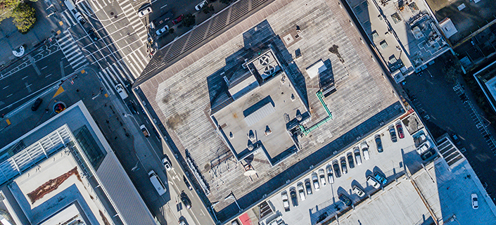 An aerial birds eye  view of San Francisco looking straight down at the skyscrapers and streets in the financial district.