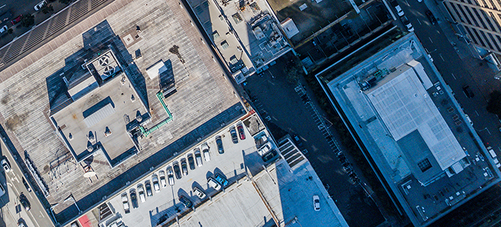 An aerial birds eye  view of San Francisco looking straight down at the skyscrapers and streets in the financial district.